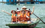 Rowing-on-bamboo-boat-to-explore-Halong-Bay