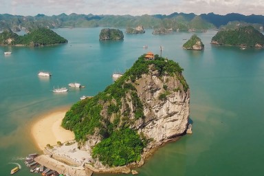 DAY 1: HALONG INTERNATIONAL PORT- SUPPRISE CAVE- TITOP ISLAND
